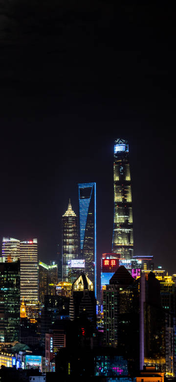 Bustling night scene of Lujiazui skyscrapers in Shanghai, China