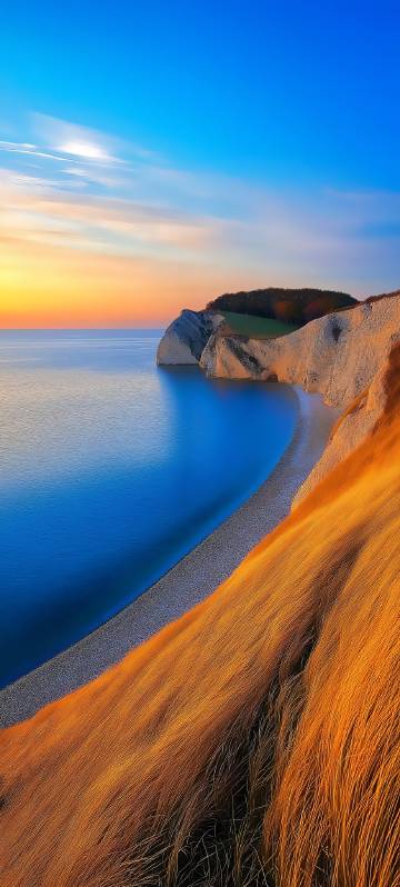 Dreamy cliff seaside sunset phone wallpaper