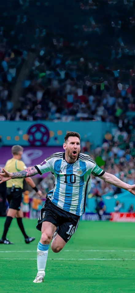 Messi cheering on the soccer field Wallpaper