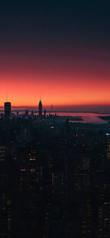 Beautiful Manhattan Cityscape Under A Fiery Sky Wallpaper