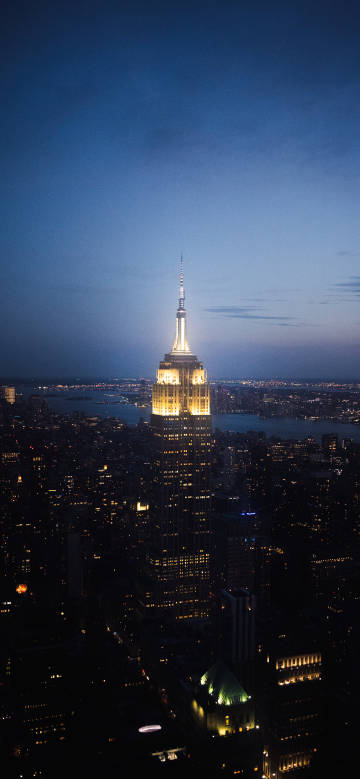 Aerial view of Empire State Building at night in New York
