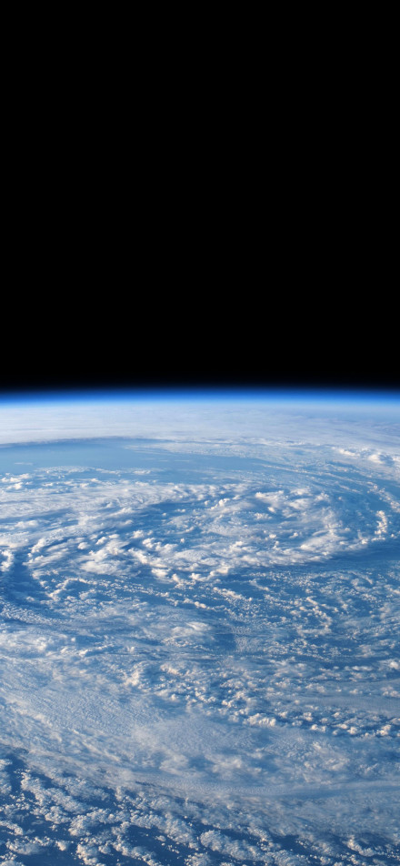 Space View of Earth’s Clouds 4K Wallpaper