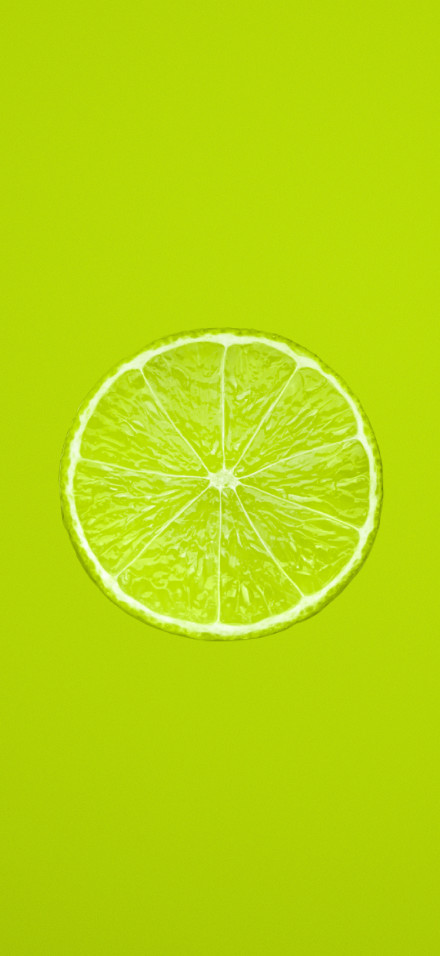 Minimalist Lemon Slices On Pure Green Background