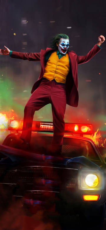 Joker Standing on Car Movie Scene 4K Phone Wallpaper