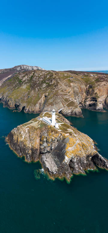 Aerial View of Seaside Lighthouse Phone Wallpaper Aerial View of Seaside Lighthouse Phone Wallpaper