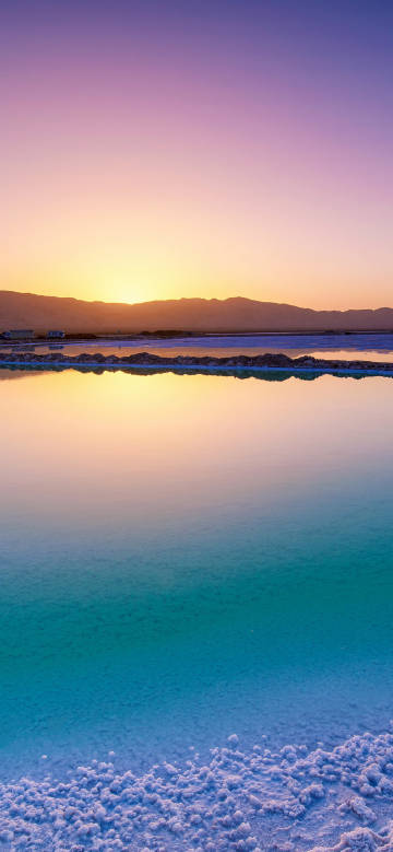 Beautiful scenery of salt lake at sunset phone wallpaper