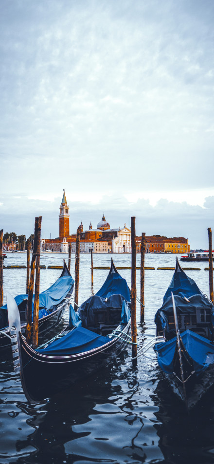 Venice wallpaper: gondolas on the water and churches in the distance