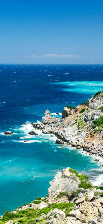 Beautiful blue sea and rocky scenery phone wallpaper