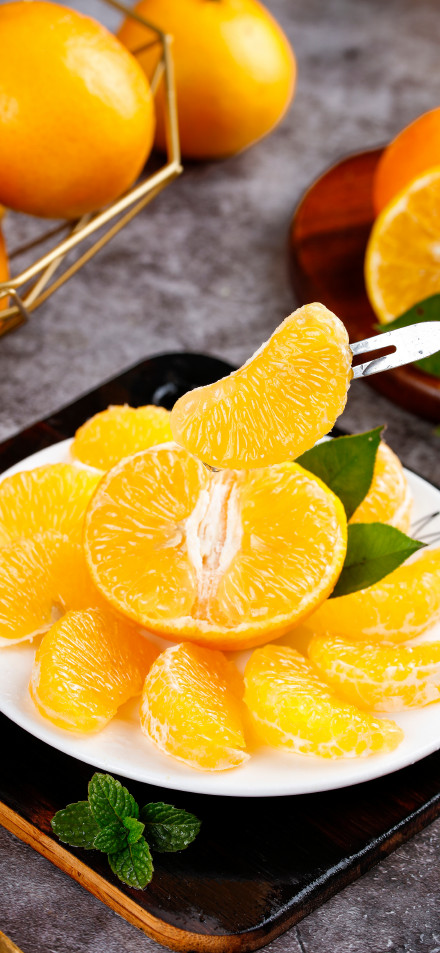 Juicy Orange Slices On White Plate 4K Phone Wallpaper