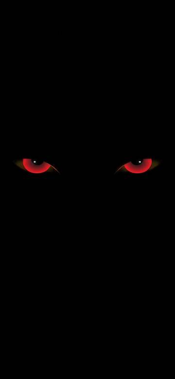 A pair of red eyes on a black background