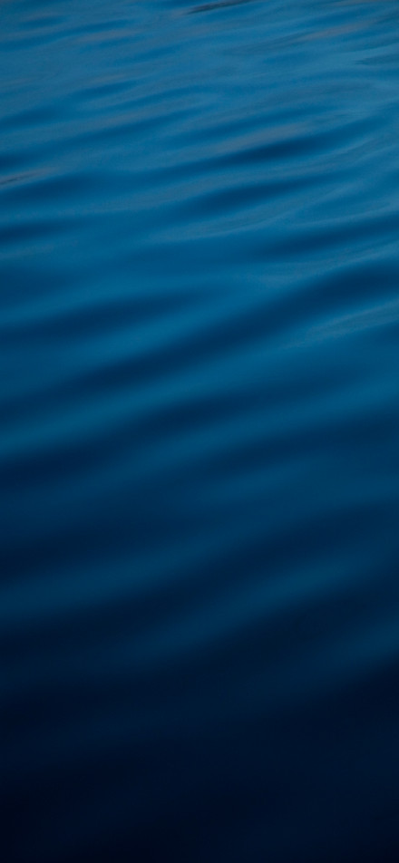 Blue water with ripples phone wallpaper