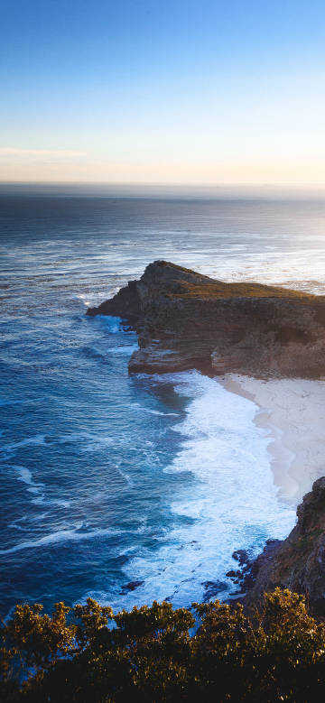 Beautiful coastal scenery with clear sky phone wallpaper