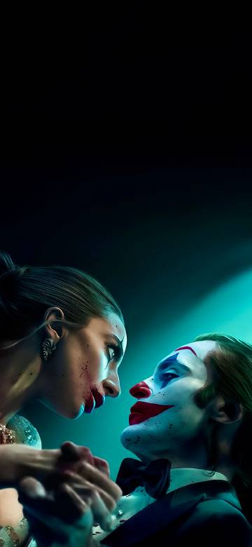 Joker and Halle stare at each other in dim light phone wallpaper