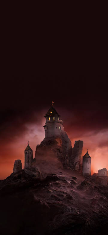 Mysterious castle on a rocky peak at dusk phone wallpaper