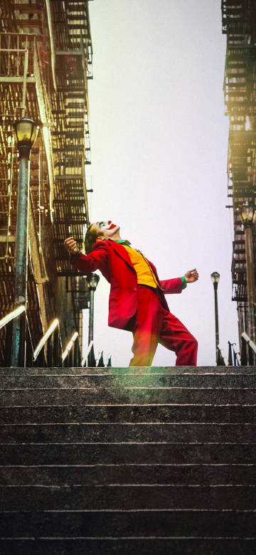 The clown dances on the stairs phone wallpaper