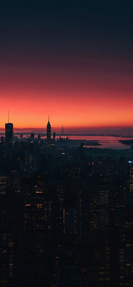 Beautiful Manhattan Cityscape Under A Fiery Sky Wallpaper