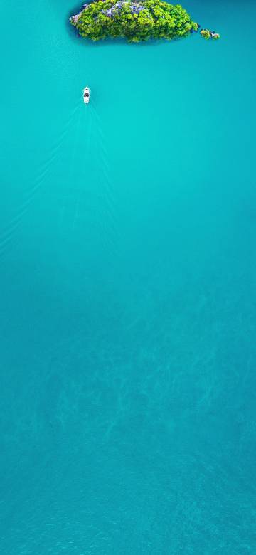 Tropical Islet in Turquoise Water Aerial Photo