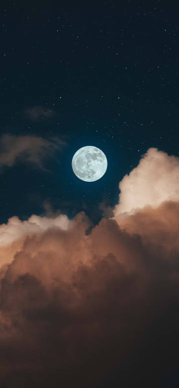 Bright Moon Floating Above Orange Clouds