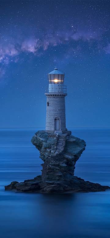 Lonely Lighthouse on a Rock Under Starry Sky 4K UHD Wallpaper Lonely Lighthouse on a Rock Under Starry Sky 4K UHD Wallpaper