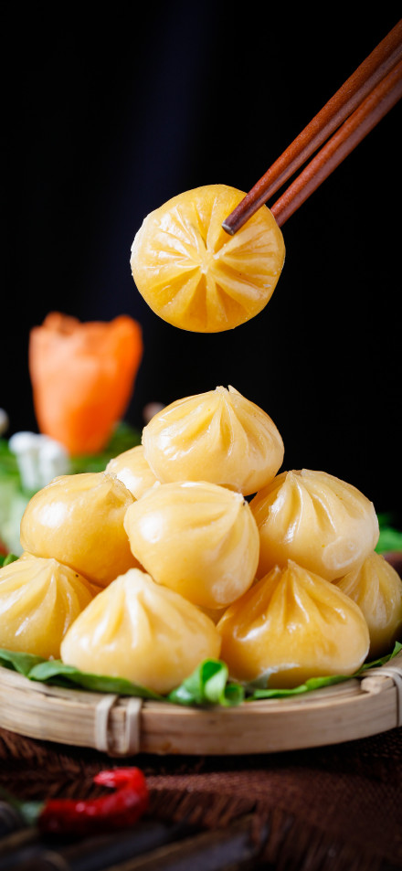 Tempting golden dumplings phone wallpaper