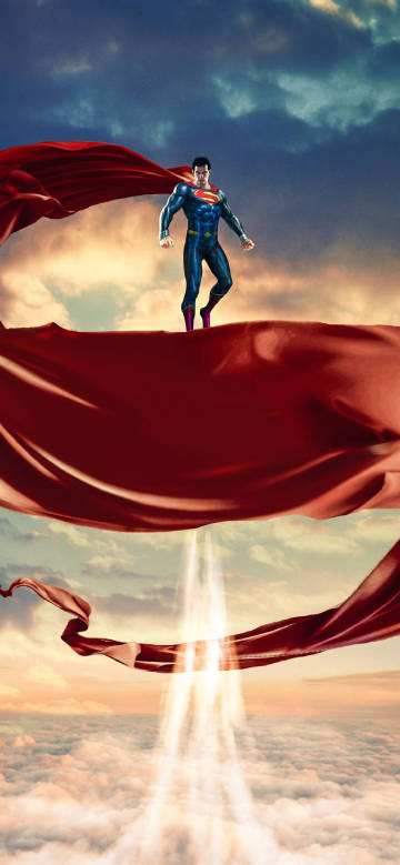 Superhero Superman Standing on a Red Cape Phone Wallpaper Superhero Superman Standing on a Red Cape Phone Wallpaper