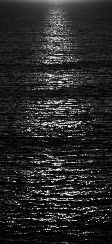 Calm Sea Shimmering in the Dark 4K Phone Wallpaper