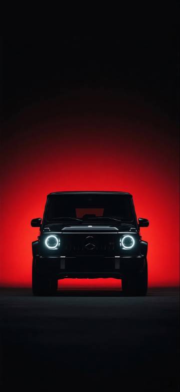 A Mercedes-Benz on a Red Background Wallpaper