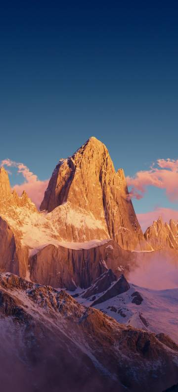 Golden Snowy Mountain Peak At Sunset Wallpaper