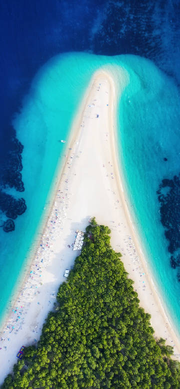 Golden Horn Beach on Brac Island, surrounded by sea water