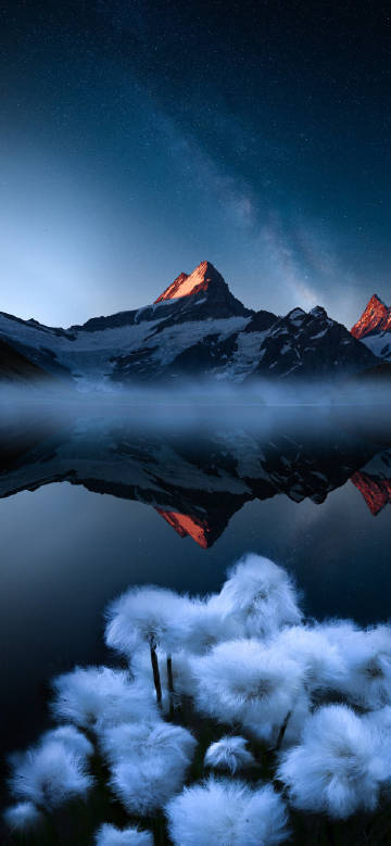 Tranquil and magnificent snow-capped mountain lakes at night