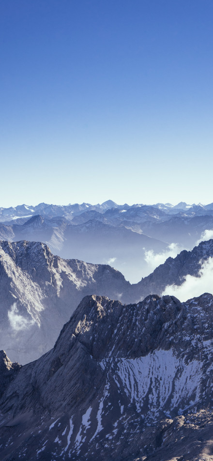 Majestic mountains under the blue sky phone wallpaper