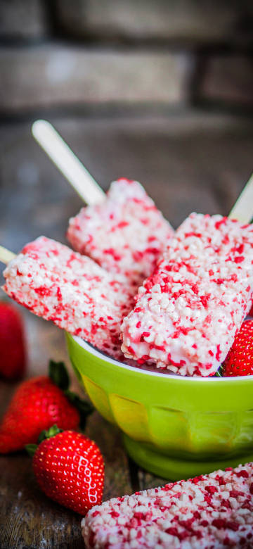 Delicious strawberry popsicles phone wallpaper