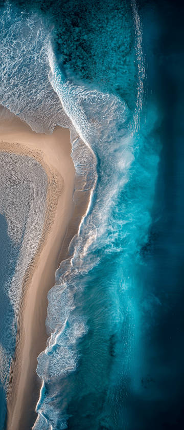 Overlooking Blue-green Waves and Sandy Beach Wallpaper